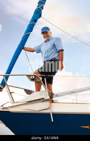 Portrait of senior man on sailboat