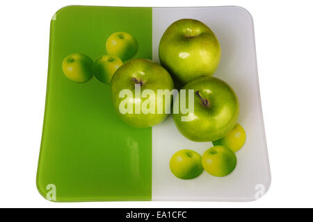 Three fresh apples in a plate Stock Photo