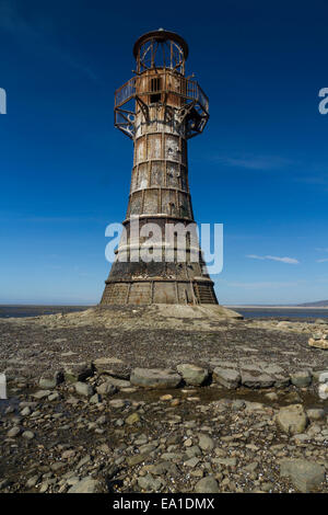 Whiteford Lighthouse is the only wave swept cast iron lighthouse in Britain. See here at low tide. Whiteford Point, Whiteford Sa Stock Photo