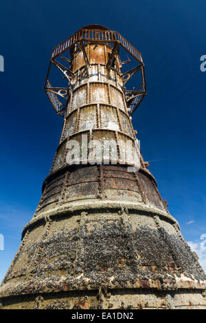 Whiteford Lighthouse is the only wave swept cast iron lighthouse in Britain. See here at low tide. Whiteford Point, Whiteford Sa Stock Photo