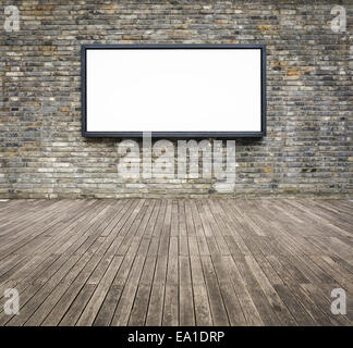 blank advertising billboard on a brick wall Stock Photo