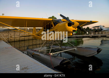 Piper Super Cub on Floats docked at the Sky Lark Motel dock, Seaplane Splash-In, Lakeport, California, Lake County, California Stock Photo