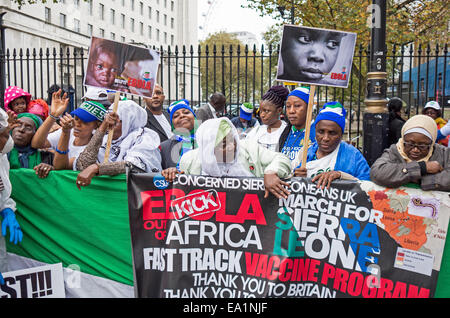 Sierra Leoneans protest outside Downing Street over UK Government's lack of action on the Ebola vaccine program. Stock Photo