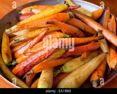 New York, NY  Chef Tom Colicchio prepares a Thanksgiving meal, including roasted carrots, at his restuarant Kraft. Stock Photo