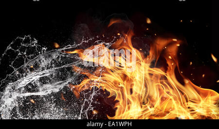 Symbol of water and fire energy, isolated on black background Stock Photo