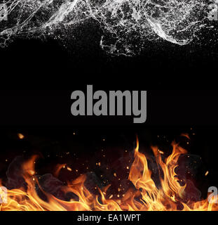 Symbol of water and fire energy, isolated on black background Stock Photo