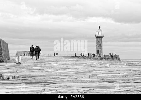 Whitby harbour looking over west pier,  North Yorkshire, England Stock Photo