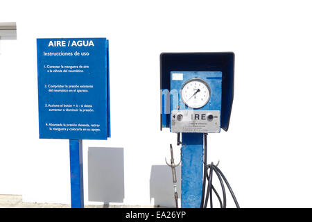 Gas station air pump, and water at Petrol station, border of Spain and Portugal. Southern Spain Stock Photo