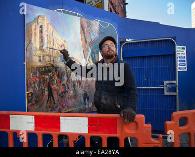 Urban Landscapes of Manchester, Rob Pointon, UK Plein Air artist, working on a themed oil painting, street scenes painted in the city centre, Market St, Manchester. Painting outdoors artwork to be exhibited at the Northern Art specialist in a solo show at the Colourfield Gallery,  Rob Pointon is said to be one of the most exciting artists working and living in the UK. His exceptional talents have been recognized by a host of commissions and acquisitions by high profile collectors, of whom the list is headed by HRH The Prince of Wales. Stock Photo