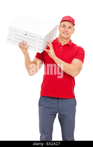 Pizza delivery guy carrying boxes over his shoulder isolated on white background Stock Photo