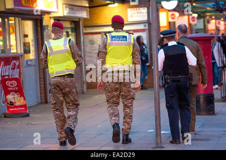 The Military police have joined forces with the Metropolitan Police to control the revelers from today's Army vs. Navy rugby match in Twickenham  Where: London, England, United Kingdom When: 03 May 2014 Stock Photo