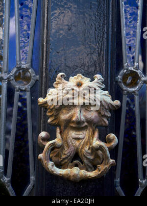 The Green man gothic door knocker in the historic village of Heptonstall in West Yorkshire England Stock Photo