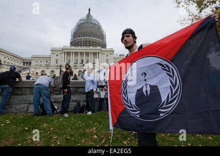 Washington, DC, USA. 5th November, 2014. Hundreds of Anonymous led demonstrators rally in Washington, DC, protesting against austerity, mass surveillance and oppression on this Guy Fawkes Day Credit:  B Christopher/Alamy Live News Stock Photo