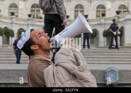 Washington, DC, USA. 5th November, 2014. Hundreds of Anonymous led demonstrators rally in Washington, DC, protesting against austerity, mass surveillance and oppression on this Guy Fawkes Day Credit:  B Christopher/Alamy Live News Stock Photo