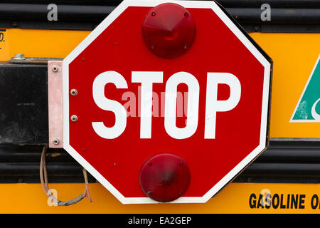 stop sign on a type a gmc north american short yellow school bus Saskatchewan Canada Stock Photo