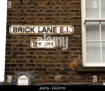 Street name sign, 'Brick Lane' in both English and Pakistani. Brick Lane is famous for its 'Indian' restaurants Stock Photo