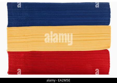 Stack of red yellow and blue napkin paper Stock Photo