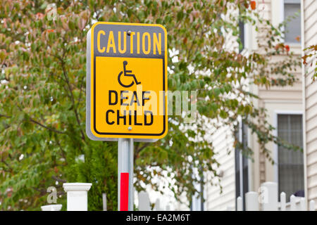 Deaf child warning sign on residential street - USA Stock Photo