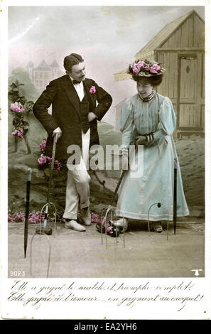 Postcard depicting a couple playing croquet Stock Photo