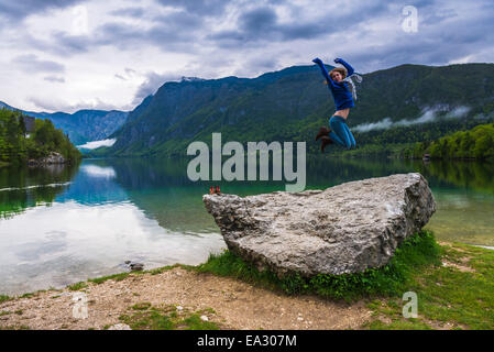 Tourist visiting Lake Bohinj, Triglav National Park, Julian Alps, Slovenia, Europe Stock Photo