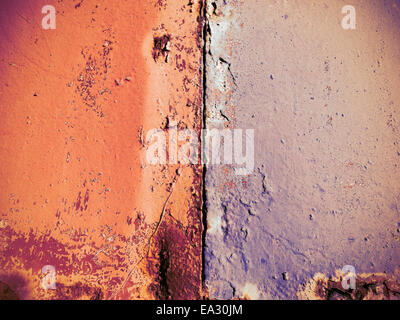 Rusted painted metal wall, close up background. Stock Photo