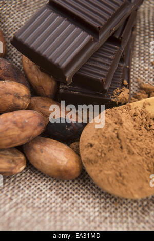 Cocoa (cacao) beans with chocolate Stock Photo