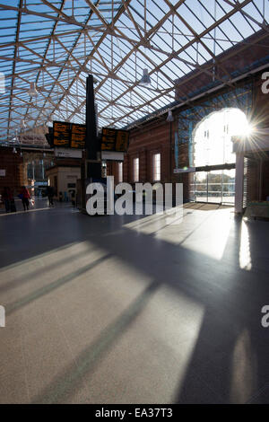 Sun flare and shadows in the newly refurbished train station in Nottingham City, England UK Stock Photo