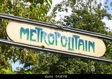 Art-Deco styled Street sign at the entrance to the Paris Metro Stock Photo