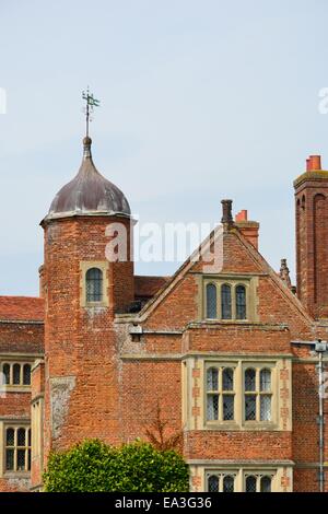 Tudor Brick Building with tower Stock Photo