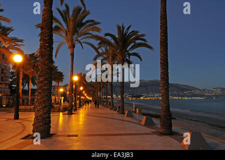 Beach promenade, dusk, Albir, Spain Stock Photo