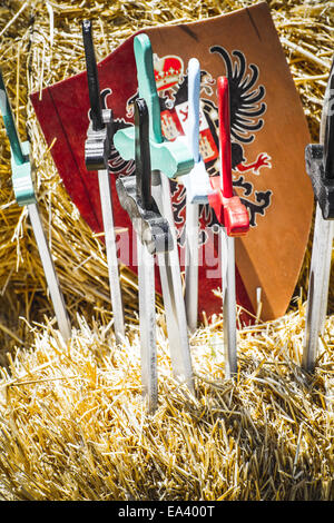 handmade wooden swords in a medieval fair Stock Photo