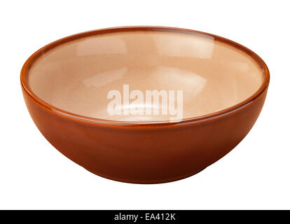 Empty brown ceramic bowl with a beige center. The subject is isolated on white. Stock Photo