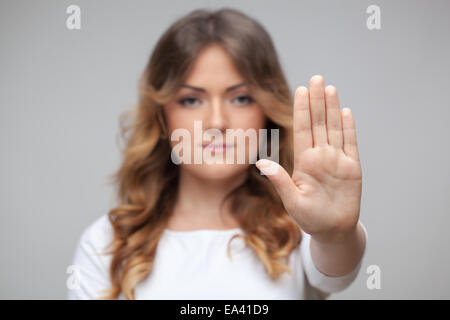 female hand stop sign isolated on white Stock Photo