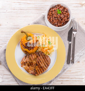 Steak with rice stuffed peppers Stock Photo