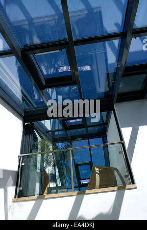 Glazed roof in atrium of modern residential house, UK Stock Photo