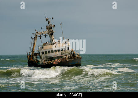 Wreck of a trawler on the shore of the Skeleton Coast, Namibia Stock Photo