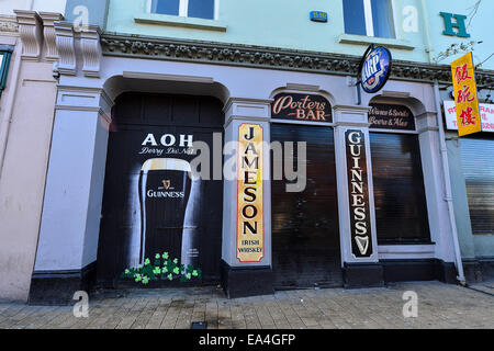 Stock Photo -Jamson Whiskey and Guinness signs on Irish pub exterior. Photo: George Sweeney/Alamy Stock Photo