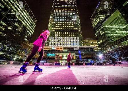 London, UK. 6th Nov, 2014.  Canary Wharf Ice Rink launches with ‘Human Fire Torch’ spectacle Credit:  Guy Corbishley/Alamy Live News Stock Photo