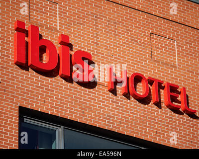 Ibis Hotel sign on outside wall UK Stock Photo