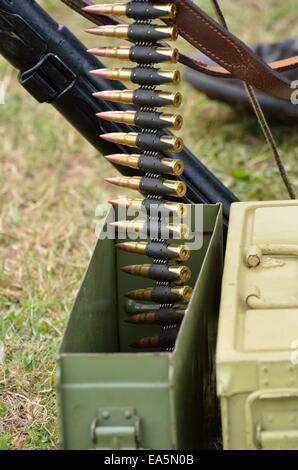 Belt of Machine gun bullets Stock Photo