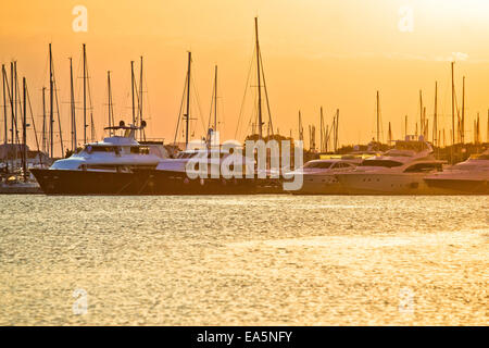 Golden sunset at yacht club Stock Photo