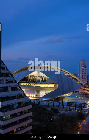 Aerial view over the palacio de las artes reina sofia concert hall lit up at night from the 11th floor of a nearby building, Val Stock Photo