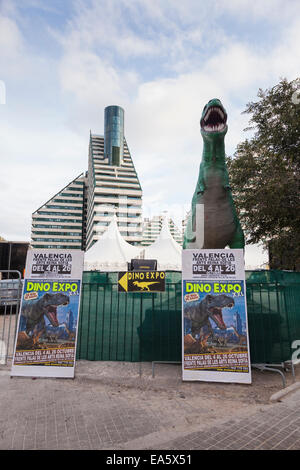 Giant dinosaur model advertising an exhibition in Valencia, Spain. Stock Photo