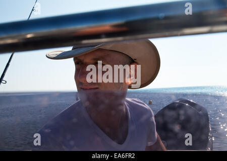 Italy, Puglia, TA, Ginosa, Marina di Ginosa, Italian fisherman in hat Stock Photo