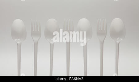 Forks and spoons isolated on white background Stock Photo