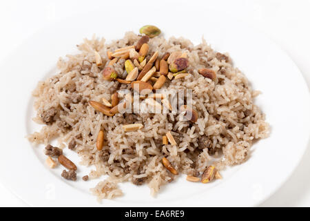 Spiced rice in the Lebanese or Arab style, toped with freshly roasted pine nuts Stock Photo