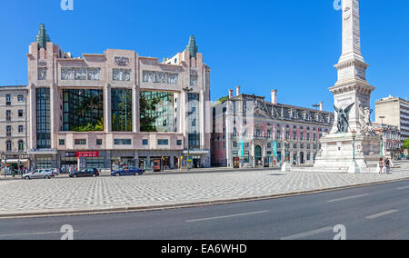 Eden Hotel in the Restauradores Square with monument to the restoration of the independence. Foz Palace seen back on the right. Stock Photo