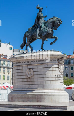 Figueira Square in the Baixa district in Lisbon , Portugal. King Dom Joao I statue. Stock Photo