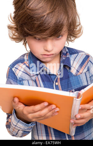 Blond cute boy reading a book over white Stock Photo