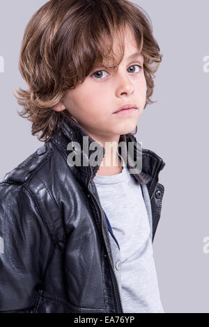 Fashion little boy wearing a leather jacket Stock Photo - Alamy